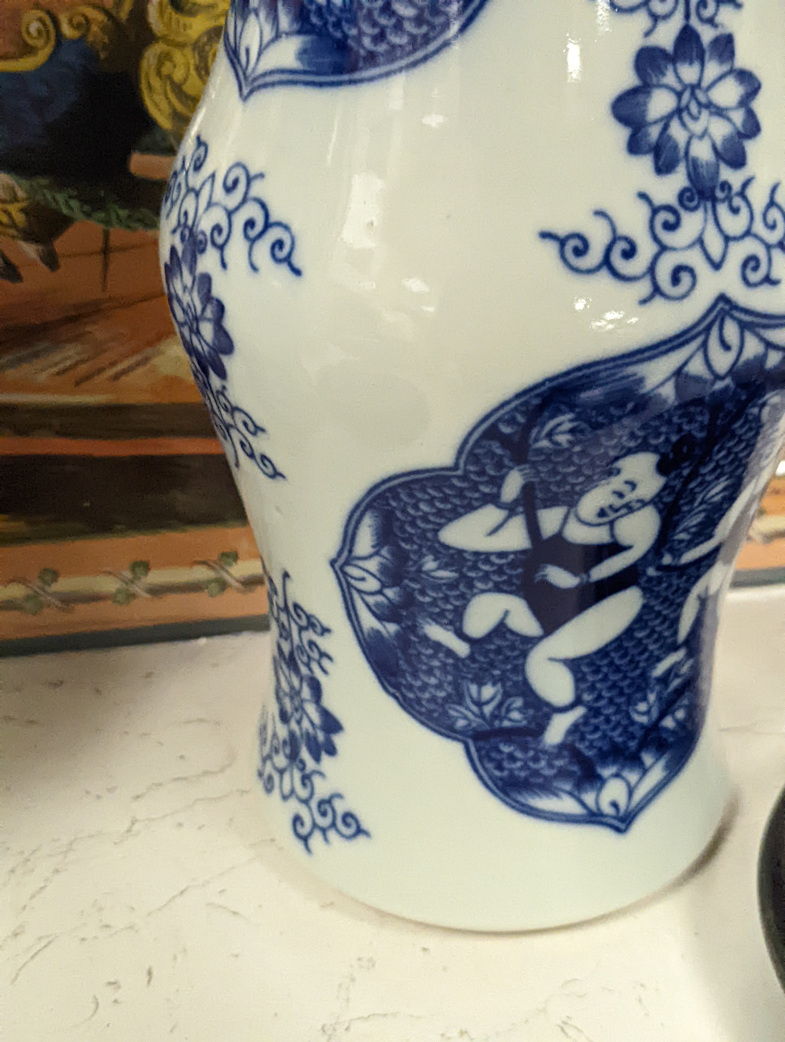 A pair of Chinese blue and white vases on stands and 6 further wood stands. Vases 35cm